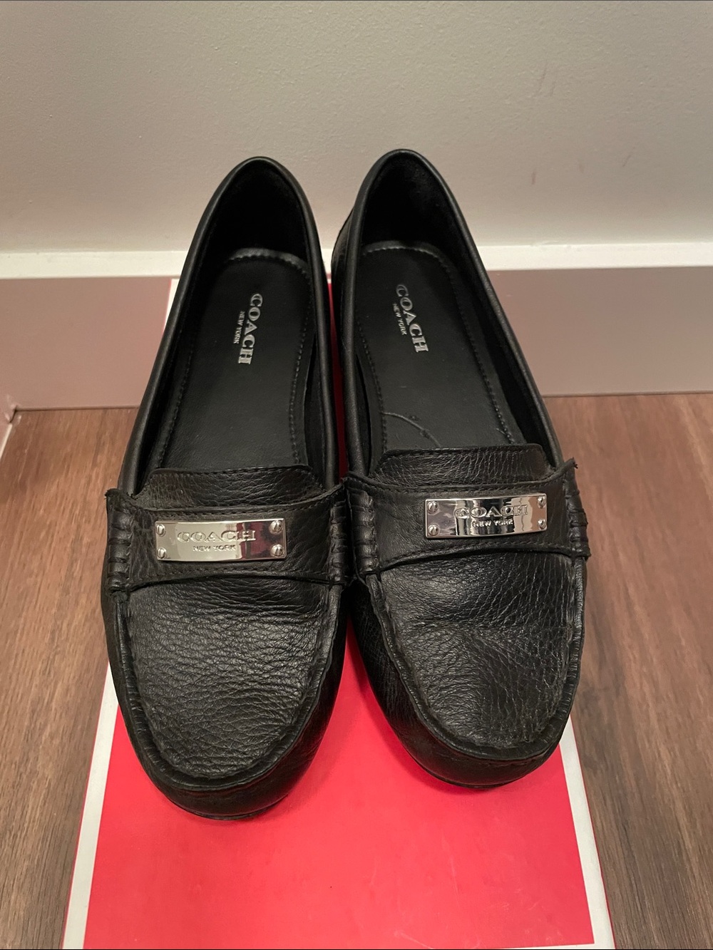 Coach Black Leather Penny Loafers with Silver Plaque